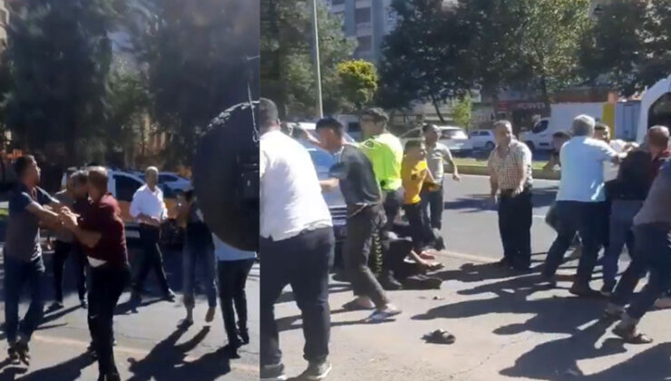Park halindeki otomobile çarpan şahsa meydan dayağı