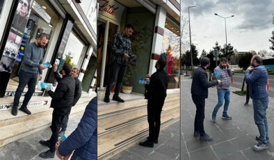 Broşür dağıtarak adaylara destek istedi
