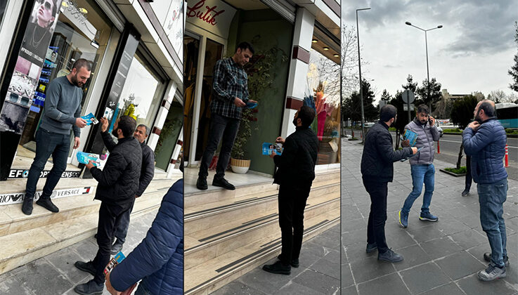 Broşür dağıtarak adaylara destek istedi