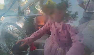 Arabada mahsur kalan çocuk sonunda kurtarıldı