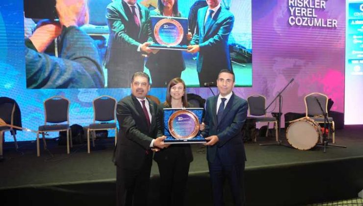 Küresel riskler zirvesinde eş başkanlara plaket