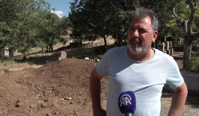 Kazdığı mezara giren adam, operatörü yasa boğdu