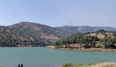 Ormanlık alanda çıkan yangına havadan ve karadan müdahale