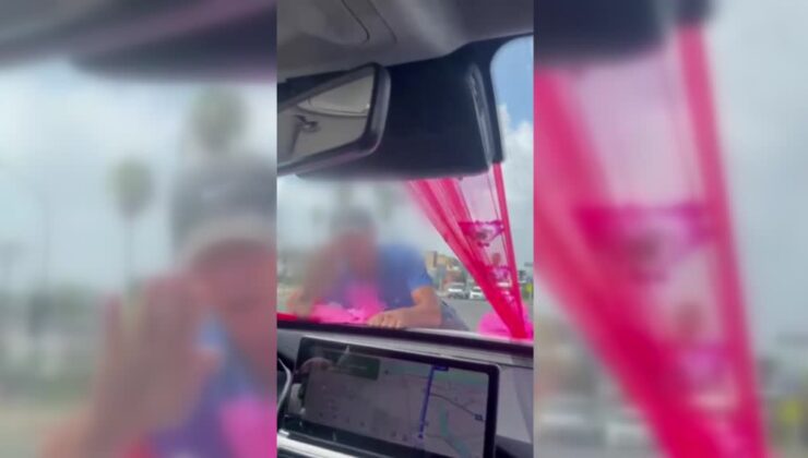 Gelin arabasının kaputuna tutunarak para isteyen zanlı gözaltına alındı